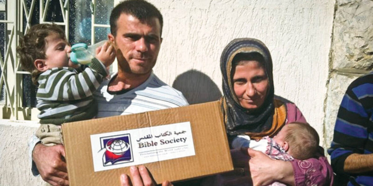 More than 260,000 refugees from Syria have fled to Lebanon. Most are traumatized and desperate. Here are Syrian refugees in Lebanon receiving relief packages and Scriptures from the Bible Society of Lebanon. Photo courtesy of the Bible Society of Lebanon